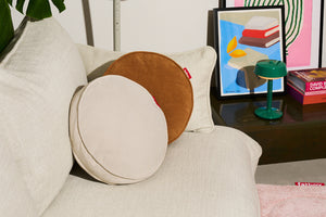 Teddy Bear Recycled Cord Pill Pillow on a Couch