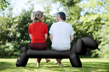 Load image into Gallery viewer, Guy and Girl Sitting on a Black Fatboy Attackle Bench