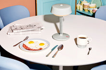 Load image into Gallery viewer, Desert Fatboy Bellboy Lamp on a Dining Table