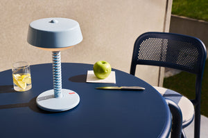 Jet Blue Fatboy Bellboy Lamp on a Toni Bistreau Table