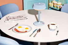 Load image into Gallery viewer, Jet Blue Fatboy Bellboy Lamp on a Kitchen Table