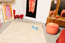 Load image into Gallery viewer, Creamy Camel Fatboy Dot Carpet in a Bedroom