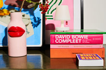 Load image into Gallery viewer, Fatboy Edison Mini Sitting on a Stack of Books