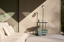 Load image into Gallery viewer, Dark Sage Fatboy Jolly Trolley on a Patio Next to a Paletti