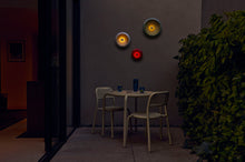Load image into Gallery viewer, Lobby Red Fatboy Oloha Small Hanging on a Patio Wall at Night
