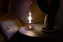 Load image into Gallery viewer, Transparent Fatboy Transloetje Lamp Sitting on a Bakkes Table