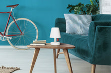 Load image into Gallery viewer, Fatboy Edison the Petit Table Lamp on Table Next to Couch