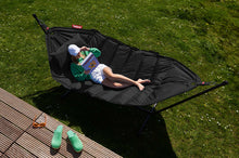 Load image into Gallery viewer, Model Laying on a Black Fatboy Headdemock Deluxe Hammock Reading a Book