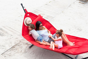 Mom and Kids Laying on a Red Fatboy Headdemock Deluxe Hammock
