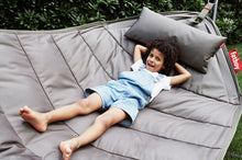 Load image into Gallery viewer, Kid Laying on a Taupe Fatboy Headdemock Hammock
