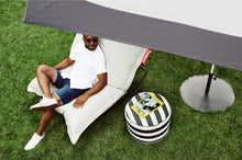 Load image into Gallery viewer, Original Outdoor Bean Bag on a Black Fatboy Rock 'n Roll Rocker