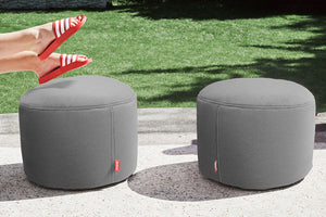 Two Rock Grey Fatboy Point Outdoor Ottomans on a Patio