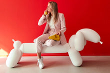 Load image into Gallery viewer, Model Sitting on a White Fatboy Attackle Talking on the Phone