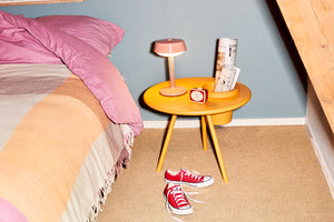 Sunbeam Fatboy Bakkes Side Table Next to a Bed