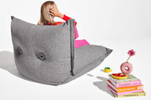 Load image into Gallery viewer, Model Sitting on a Grid Stone Fatboy BonBaron Mingle Chair