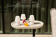 Load image into Gallery viewer, Fatboy Edison the Mini Lamps on a Brick Table