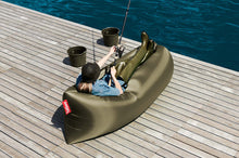 Load image into Gallery viewer, Girl Laying on a Spinach Fatboy Lamzac by the Water
