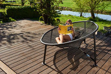 Load image into Gallery viewer, Girl Laying on a Fatboy Netorious Lounger Reading a Book