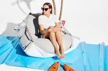 Load image into Gallery viewer, Model Sitting on a Mist Fatboy Floatzac