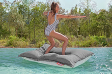 Load image into Gallery viewer, Model Standing on a Rock Grey Fatboy Floatzac in a Pool
