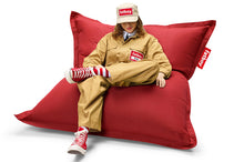 Load image into Gallery viewer, Girl Sitting on a Red Fatboy Original Outdoor Bean Bag