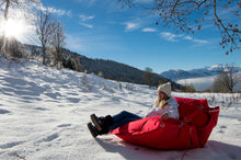 Load image into Gallery viewer, Model Sitting on a Red Fatboy Buggle-Up in the Snow
