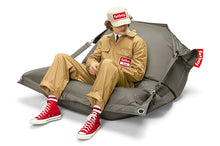 Load image into Gallery viewer, Model Sitting on a Taupe Fatboy Buggle-Up