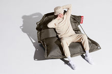 Load image into Gallery viewer, Model Sitting on a Taupe Fatboy Buggle-Up