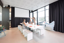 Load image into Gallery viewer, White Fatboy Concrete Seats Around a Conference Table