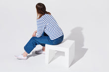 Load image into Gallery viewer, Model Sitting on White Fatboy Concrete Seat