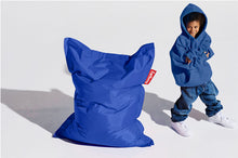 Load image into Gallery viewer, Boy Standing Next to a Petrol Fatboy Junior Bean Bag Chair