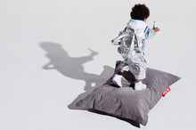 Load image into Gallery viewer, Boy Standing on Grey Fatboy Junior Stonewashed Bean Bag Chair
