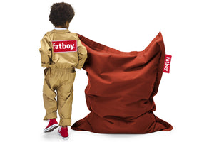 Boy Standing Next to a Rhubarb Fatboy Junior Stonewashed Bean Bag Chair