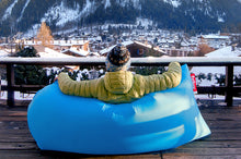 Load image into Gallery viewer, Guy Sitting on a Fatboy Lamzac the Original by the Mountains