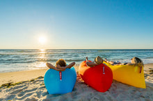 Load image into Gallery viewer, People Sitting in Fatboy Lamzac Loungers on the Beach