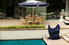 Load image into Gallery viewer, Dark Ocean Fatboy Original Outdoor Bean Bag on a Pool Deck