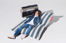 Load image into Gallery viewer, Guy Laying on a Stripe Ocean Blue Fatboy Original Outdoor Bean Bag