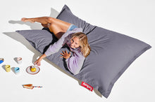 Load image into Gallery viewer, Girl Laying on a Blue Fatboy Original Stonewashed Bean Bag