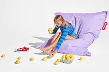 Load image into Gallery viewer, Girl Sitting on a Lilac Fatboy Original Stonewashed Bean Bag