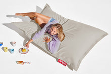 Load image into Gallery viewer, Girl Laying on a Silver Grey Fatboy Original Stonewashed Bean Bag
