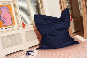 Blue Fatboy Original Slim Bean Bag Chair in a Room