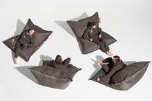 Load image into Gallery viewer, Girl Laying on a Dark Grey Fatboy Original Bean Bag in Different Positions
