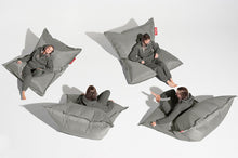 Load image into Gallery viewer, Girl Sitting on a Silver Fatboy Original Bean Bag in Different Positions