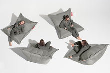 Load image into Gallery viewer, Girl Sitting on a Silver Fatboy Original Slim Nylon Bean Bag in Different Positions
