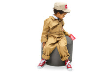 Load image into Gallery viewer, Boy Sitting on a Dark Grey Fatboy Point Ottoman