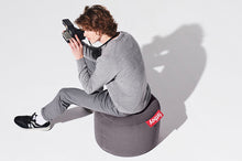 Load image into Gallery viewer, Guy Sitting on a Grey Fatboy Point Stonewashed Pouf