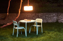 Load image into Gallery viewer, Mist Green Fatboy Toni Chairs at a Toni Bistreau Table on the Lawn
