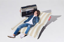 Load image into Gallery viewer, Guy Sitting on a Stripe Sandy Beige Fatboy Original Slim Outdoor Bean Bag Chair
