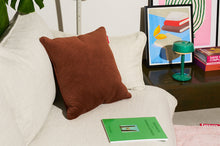 Load image into Gallery viewer, Tobacco Fatboy Recycled Royal Velvet Square Pillow on a Couch
