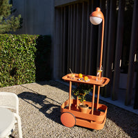 Tangerine Fatboy Jolly Trolley Bar Cart on a Patio